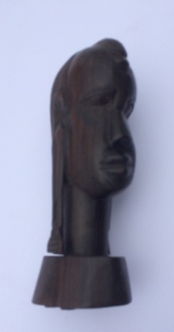 carved wooden bust of African woman